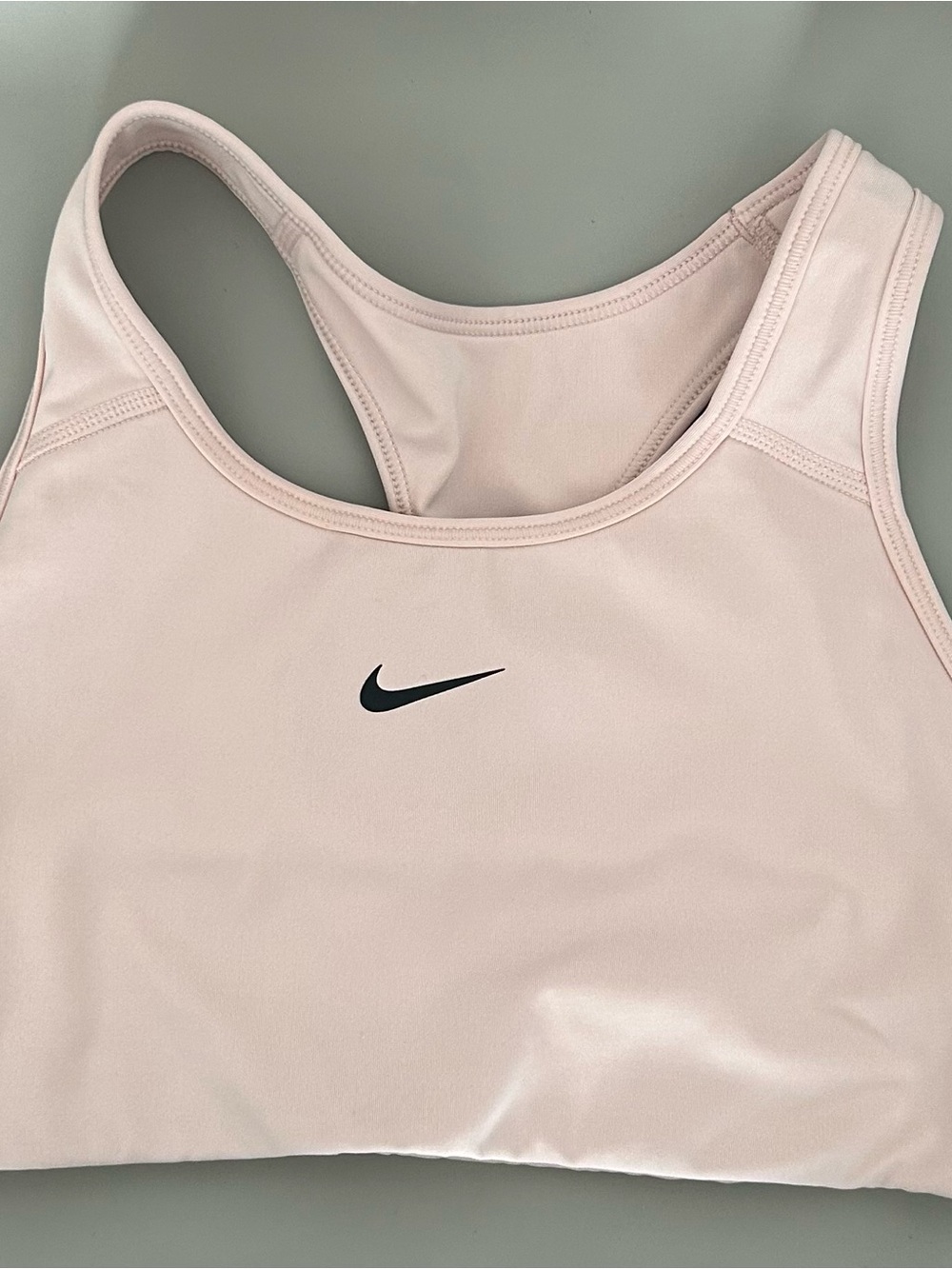 Nike Light Pink Racerback Sports Bra with Black Swoosh